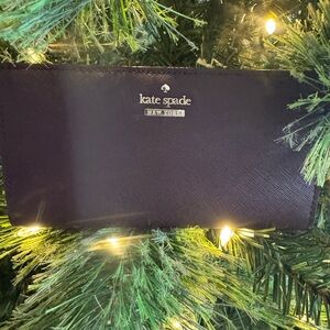 Kate Spade Elegant plum Clutch